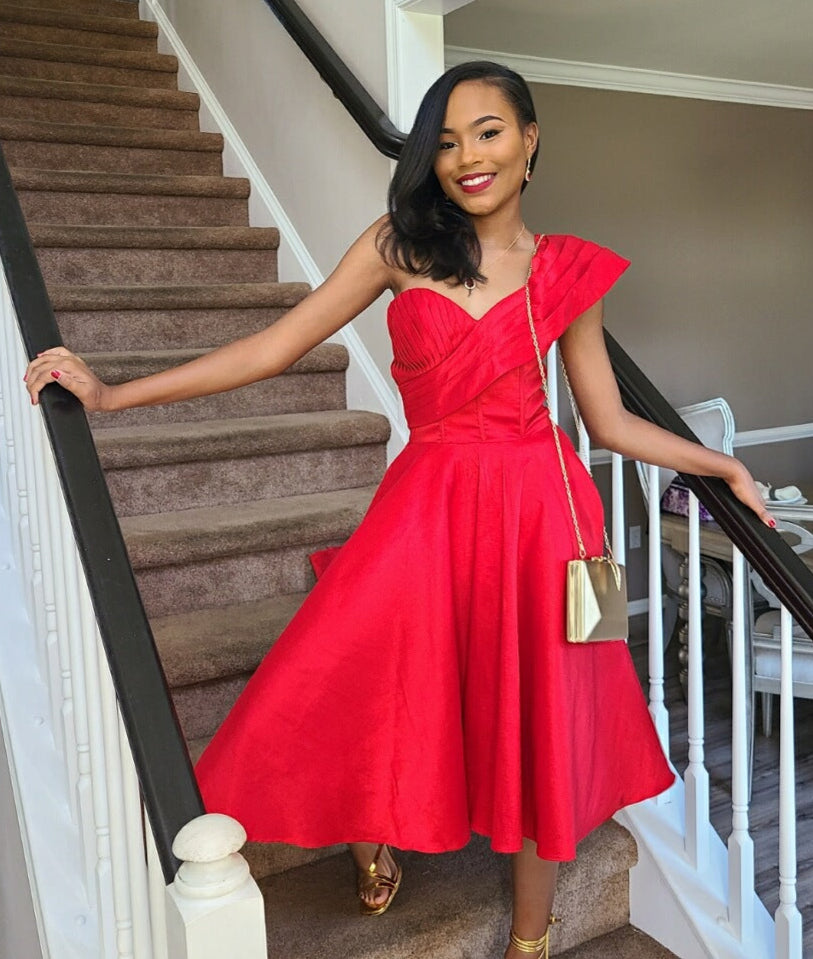 Caylen Faith in a red dress